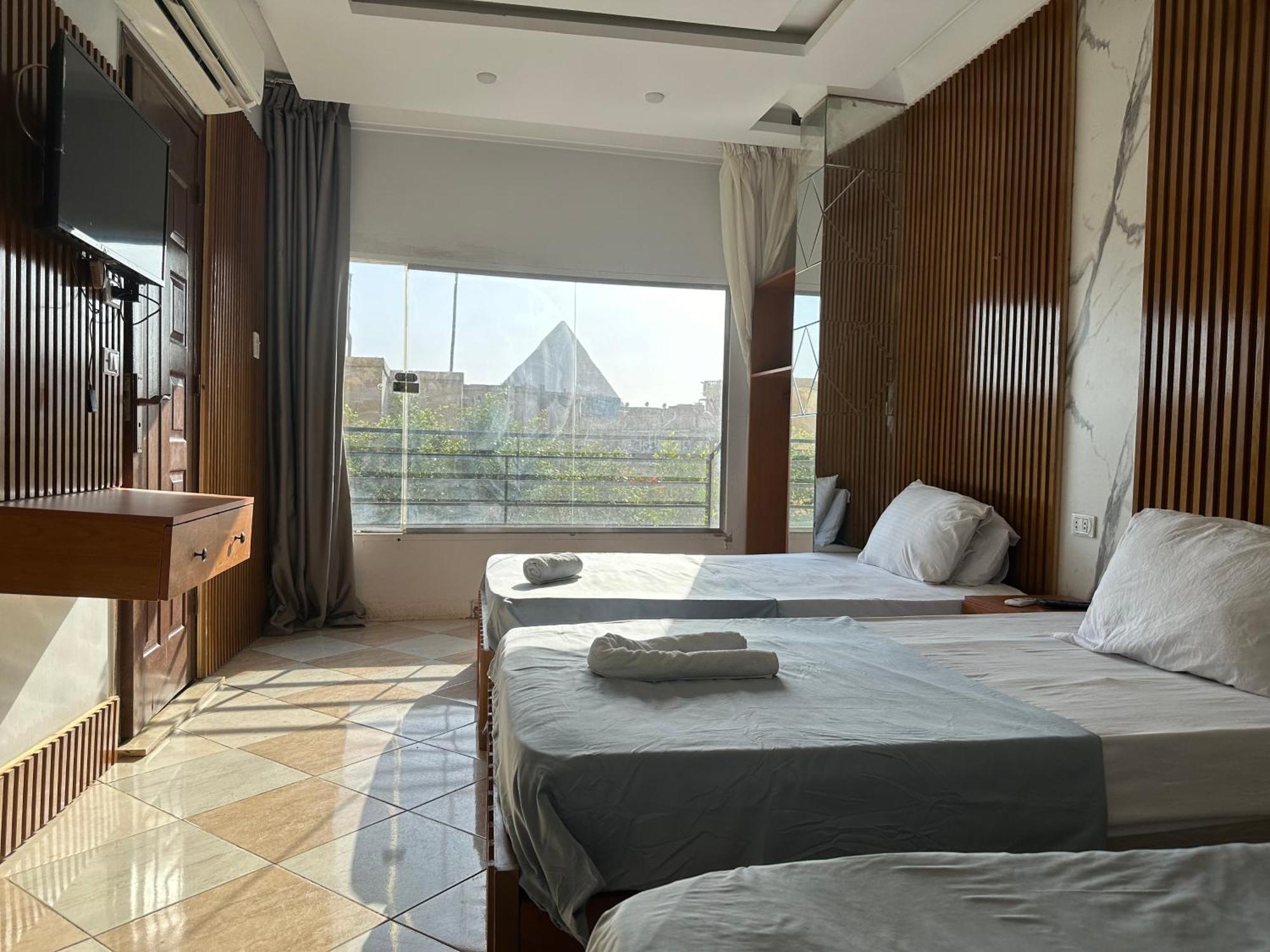 Pyramids Family Inn Kafret el-Gabal 外观 照片